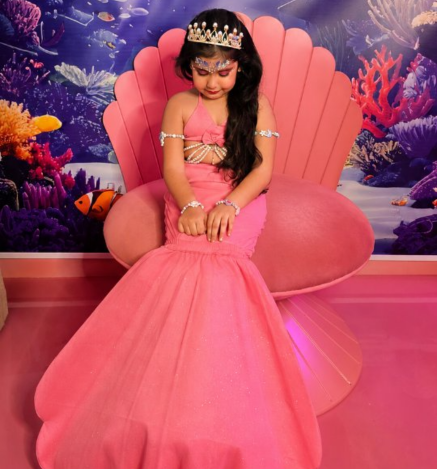 Girl enjoying a mermaid-themed experience at Wooray Dehradun